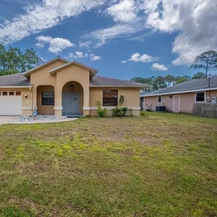 Buy this 3 bed house on 82 Brittany Lane in Palm Coast, FL 32137