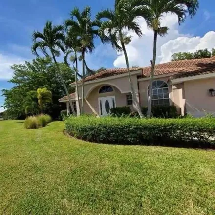 Rent this 3 bed house on 909 Moon Lake Drive in East Naples, FL 34104