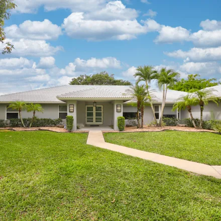 Buy this 4 bed house on 6911 West Cypresshead Drive in Parkland, FL 33067