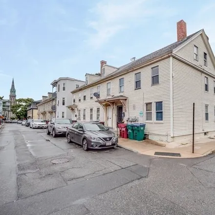 Buy this 4 bed townhouse on 46 Cork Street in Lowell, MA 01850