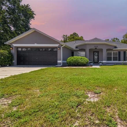 Buy this 4 bed house on 12336 Trout Circle in Spring Hill, FL 34609