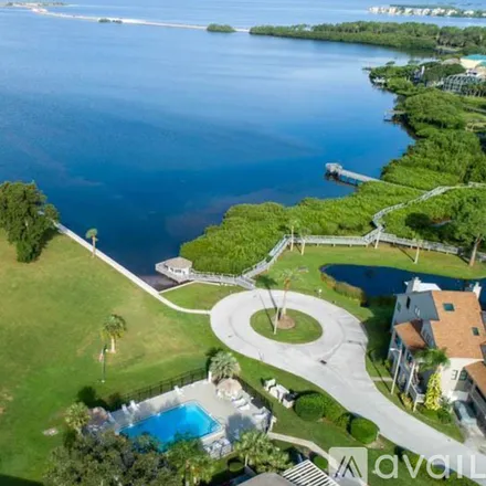 Rent this 2 bed condo on 610 Windrush Bay Dr