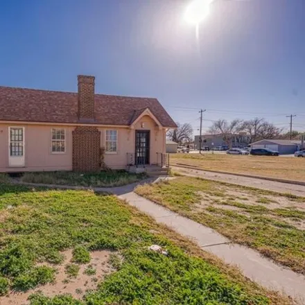 Rent this 2 bed house on 1055 West Illinois Avenue in Midland, TX 79701