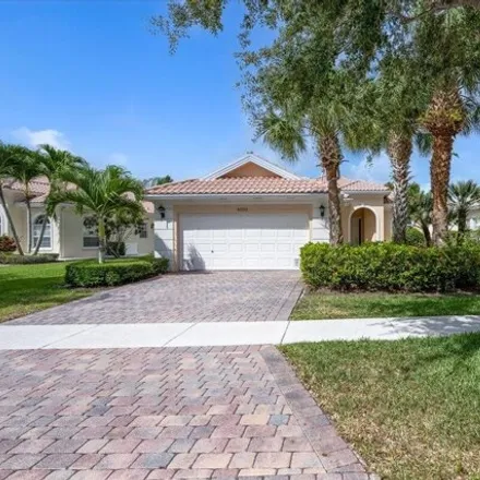 Rent this 3 bed house on Villagewalk Circle in Wellington, FL 33447