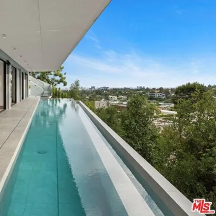 Rent this 5 bed house on 9991 Beverly Grove Drive in Los Angeles, CA 90210