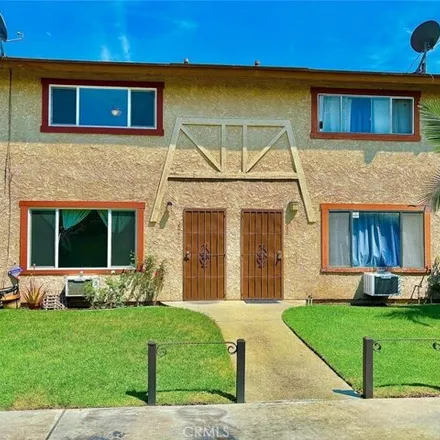 Buy this 2 bed townhouse on 7300 Richfield Street in Paramount, CA 90723