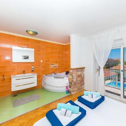 Rent this 7 bed house on HGSS Stanica Split - ispostava Kaštela in Trg hrvatske mladeži, 21215 Grad Kaštela