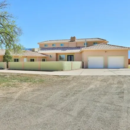 Buy this 6 bed house on 4900 Laurene Court Northwest in Albuquerque, NM 87120