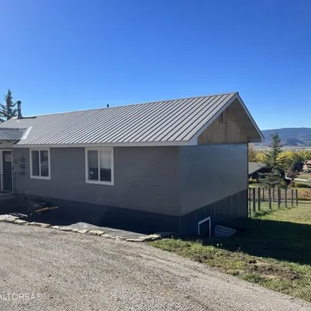 Buy this 4 bed house on 23 Chokecherry Drive in Star Valley Ranch, WY 83127