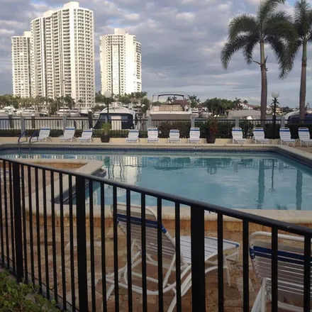 Rent this 3 bed townhouse on Wells Fargo Advisors in 19950 West Country Club Drive, Aventura
