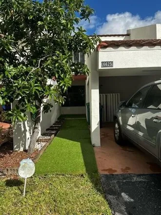 Rent this 3 bed townhouse on 6597 Racquet Club Road in Lauderhill, FL 33319