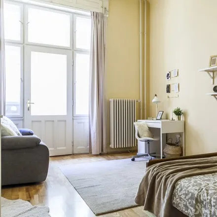 Rent this 3 bed room on Apostroph Café & Bar in 1074 Budapest, Dohány utca 45.