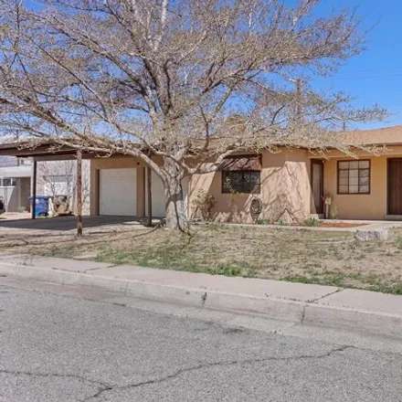 Buy this 4 bed house on 2048 Muriel Street Northeast in Matheson Park, Albuquerque
