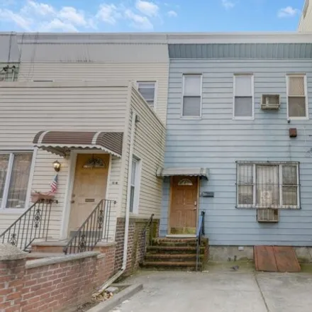 Buy this 4 bed house on 25-14 Newtown Avenue in New York, NY 11102