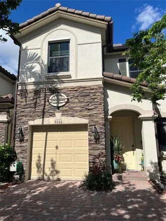 Rent this 4 bed townhouse on 9336 West 34th Court in Hialeah, FL 33018