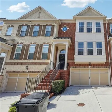 Rent this 3 bed townhouse on 5066 Ridgemont Walk Southeast in Cobb County, GA 30339