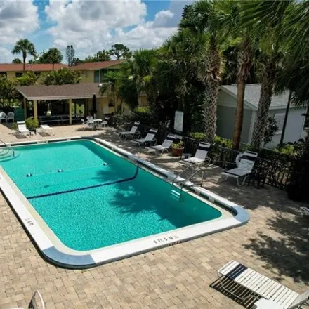 Buy this 2 bed condo on Country Road in Cypress Lake, FL 33919
