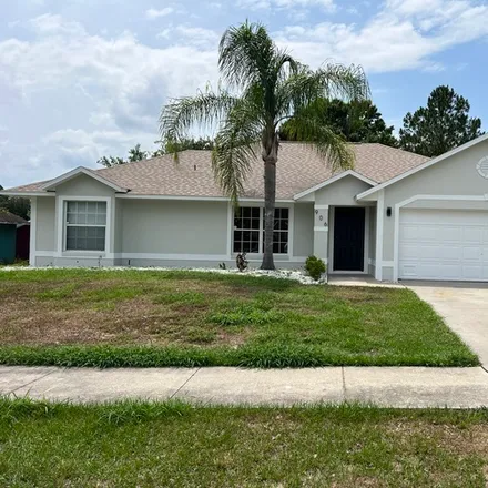 Rent this 3 bed house on 906 Palm Forest Ln