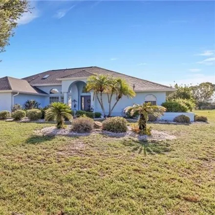 Buy this 4 bed house on 27009 Tierra del Fuego Circle in Deep Creek, Charlotte County
