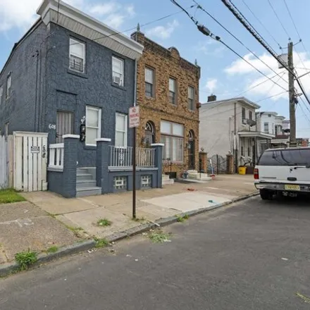 Buy this 4 bed house on 608 S 5th St in Camden, New Jersey