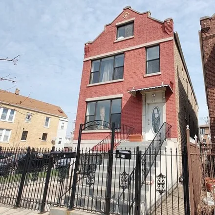 Rent this 3 bed house on 4201 South Albany Avenue in Chicago, IL 60632