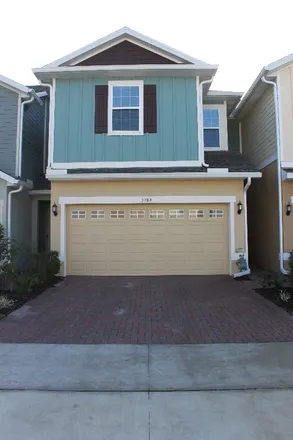 Rent this 3 bed townhouse on 5784 Spotted Harrier Way