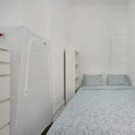 Rent this 4 bed room on Mercearia Lucinda in Rua Sampaio e Pina, 1070-051 Lisbon