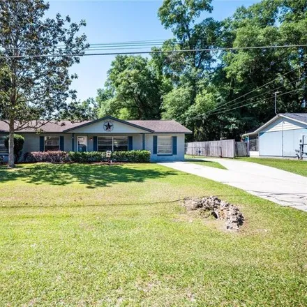 Buy this 3 bed house on 2048 Northeast 42nd Street in Marion County, FL 34479