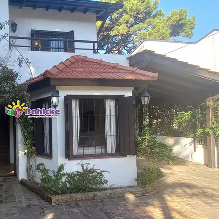Buy this 3 bed house on Calle 307 in Partido de Villa Gesell, Villa Gesell