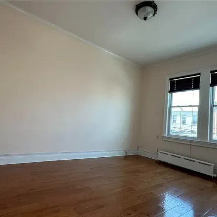 Rent this 2 bed townhouse on 32-40 87th Street in New York, NY 11369