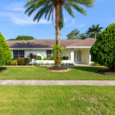Buy this 4 bed house on 1726 The 12th Fairway in Wellington, Palm Beach County