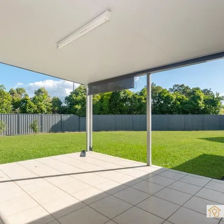 Rent this 4 bed apartment on Greentree Circuit in Bushland Beach QLD, Australia