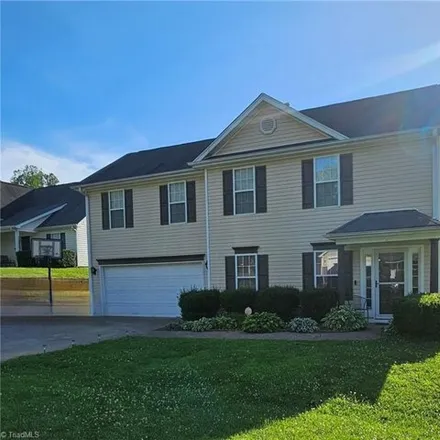 Buy this 4 bed house on 5642 Fairway Forest Drive in Winston-Salem, NC 27105