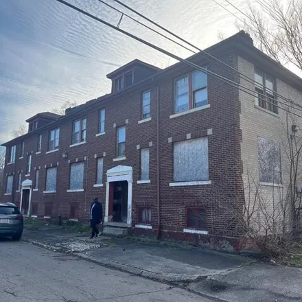 Buy this 8 bed house on Sherrill Middle School in 7300 Garden Street, Detroit