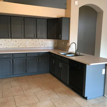 Rent this 3 bed apartment on 12471 West Holly Street in Avondale, AZ 85392