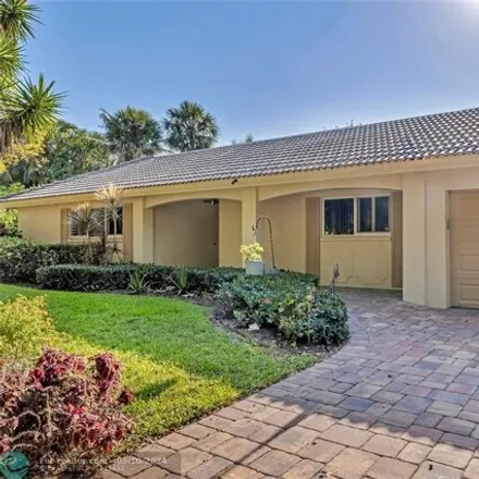 Buy this 4 bed house on 849 Cypress Grove Lane in Pompano Beach, FL 33069
