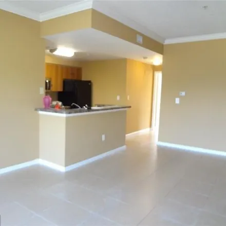 Rent this 3 bed house on Garrett Academy in West Sample Road, Coral Springs