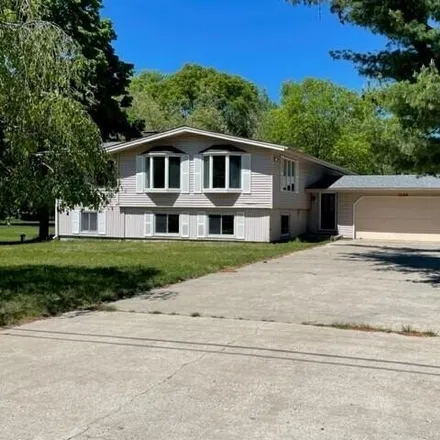 Buy this 3 bed house on 7248 Golfwood Drive in Hamlin Township, MI 49431