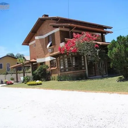 Rent this 4 bed house on Rua Jardim Giselle in Ponta das Canas, Florianópolis - SC