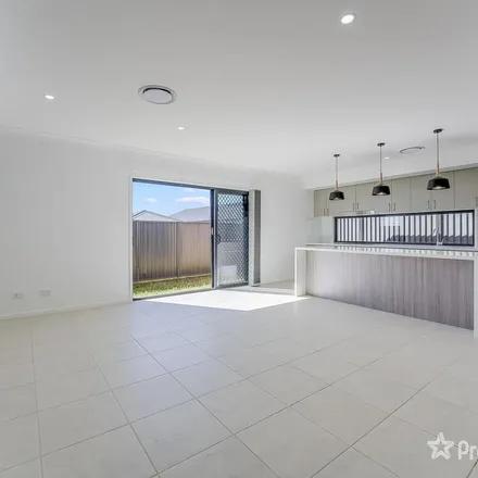 Rent this 3 bed apartment on Barrett Street in Gregory Hills NSW 2557, Australia