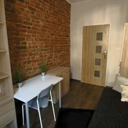 Rent this 5 bed apartment on Piekary in 61-823 Poznan, Poland