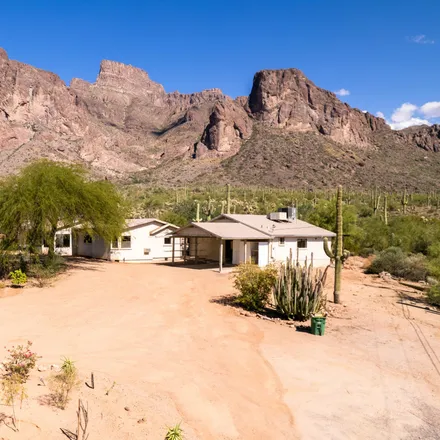 Buy this 4 bed house on 2331 East Shiprock Street in Apache Junction, AZ 85119