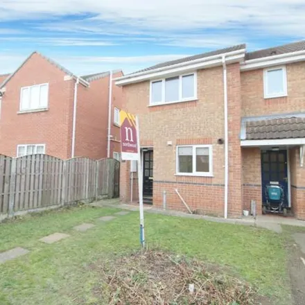 Rent this 2 bed townhouse on Manor House Court in Bentley, DN5 7XZ