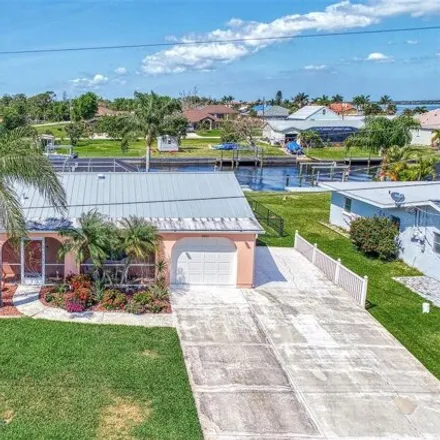 Buy this 3 bed house on 12460 Bacchus Rd in Port Charlotte, Florida