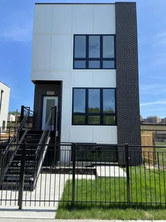 Rent this 2 bed house on 4047 South Prairie Avenue in Chicago, IL 60653
