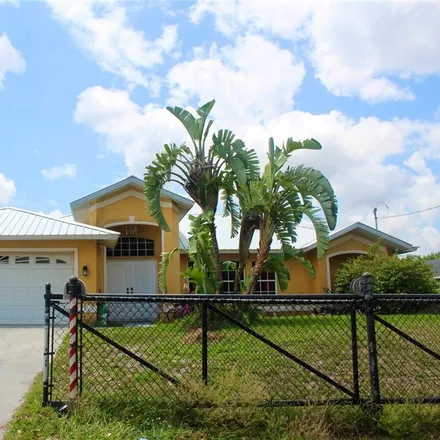 Buy this 3 bed house on 3101 3rd Street Southwest in Lehigh Acres, FL 33976