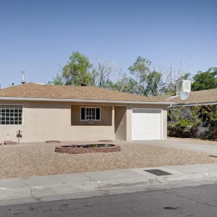 Buy this 4 bed house on 721 Jewel Place Northeast in Eastrange-Piedra Vista, Albuquerque