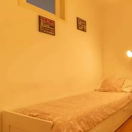 Rent this 7 bed room on Rua de Ponta Delgada in 1000-243 Lisbon, Portugal