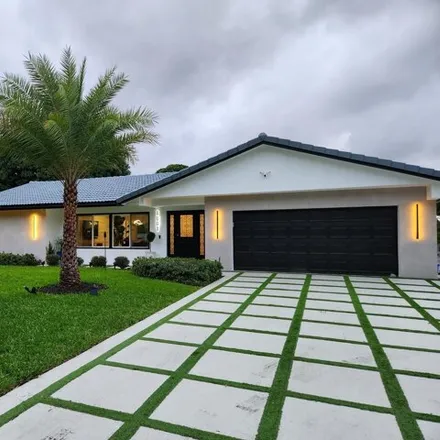 Rent this 3 bed house on 1001 NW 4th Ct in Boca Raton, Florida