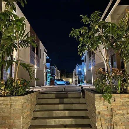 Rent this 4 bed townhouse on Paddington Terrace in Barbican, Jamaica
